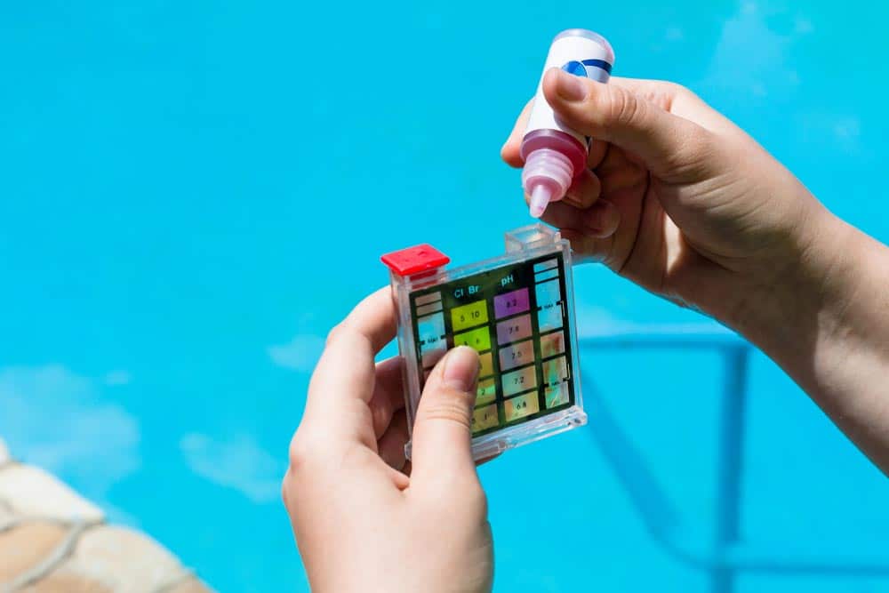 Checking Ph Level Of Water In The Pool