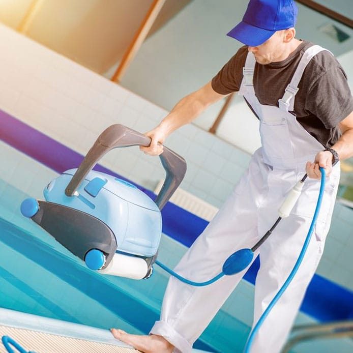 Swimming Pool Technician With Pool Cleaning Robot — Hi-Tech Pools & Spas In Yarawonga, NT
