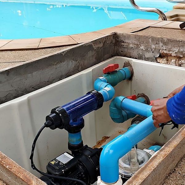 Technician Installing Swimming Pool Pump — Hi-Tech Pools & Spas In Yarawonga, NT